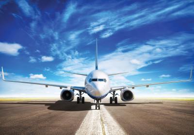 Wall mural passenger airplane runway blue sky travel